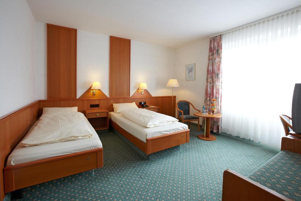 Hotel Roese Bebra Quarto foto